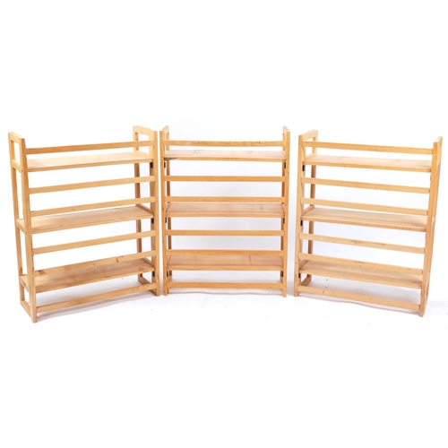 903 - Three folding light wood three shelf bookcases, 91cm H x 72cm W x  29.5cm D