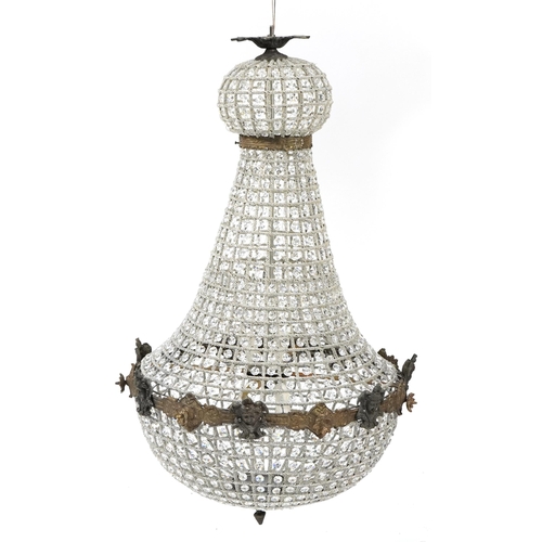 934 - Large ornate chandelier with bronzed metal mounts, 90cm high