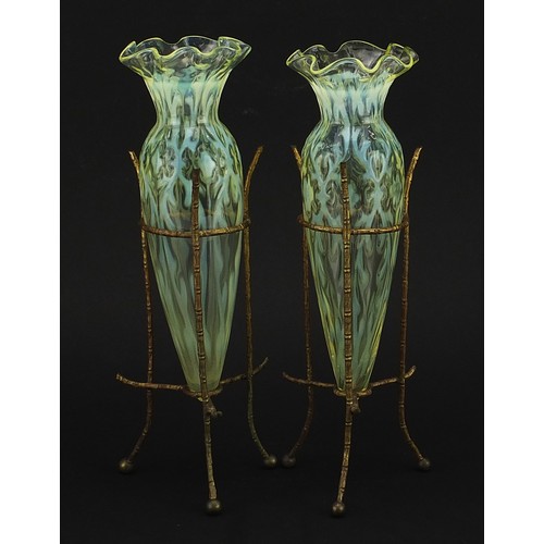 133 - Attributed to James Powell & Sons, pair of Arts & Crafts Vaseline glass vases housed in gilt metal f... 