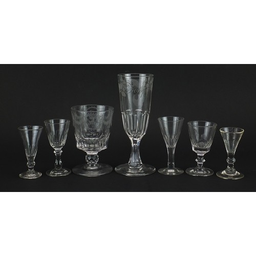 101 - Seven antique glasses including an 18th century rummer with heraldic engraving, the largest 21cm hig... 