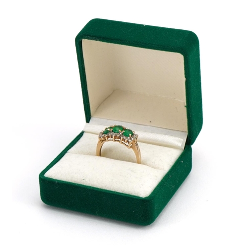 1053 - 9ct gold emerald and diamond cluster ring, size N, 3.2g