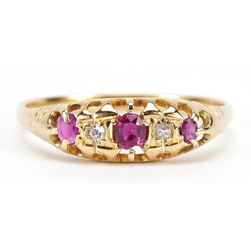 1093 - Victorian unmarked gold ruby and diamond five stone ring, indistinctly stamped to the band, size Q, ... 