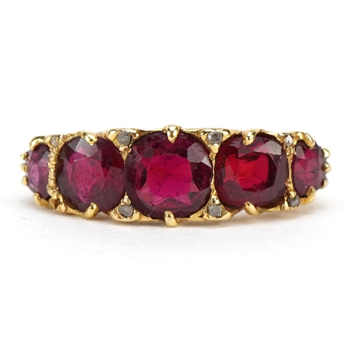 1082 - Edwardian 18ct gold red stone and diamond ring, one red stone tests as ruby, Chester 1903, the large... 