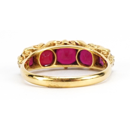1082 - Edwardian 18ct gold red stone and diamond ring, one red stone tests as ruby, Chester 1903, the large... 