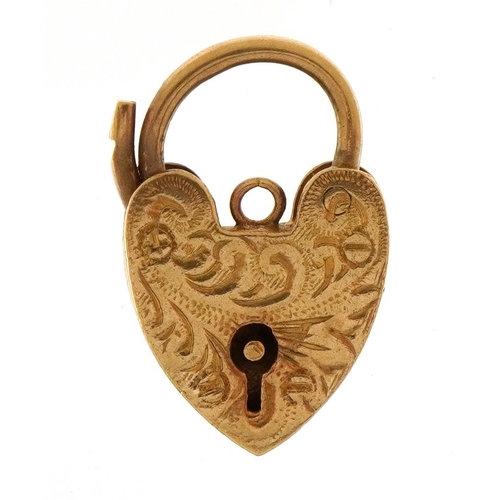 1505 - 9ct gold love heart padlock with engraved decoration, 2.1cm high, 2.4g