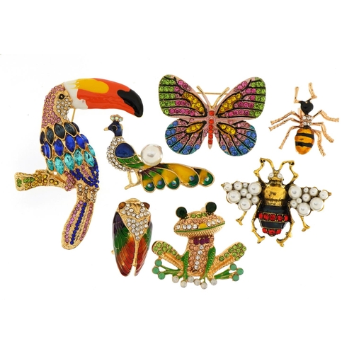 1565 - Seven jewelled and enamel animal and insect brooches including toucan, frog and peacock, the largest... 