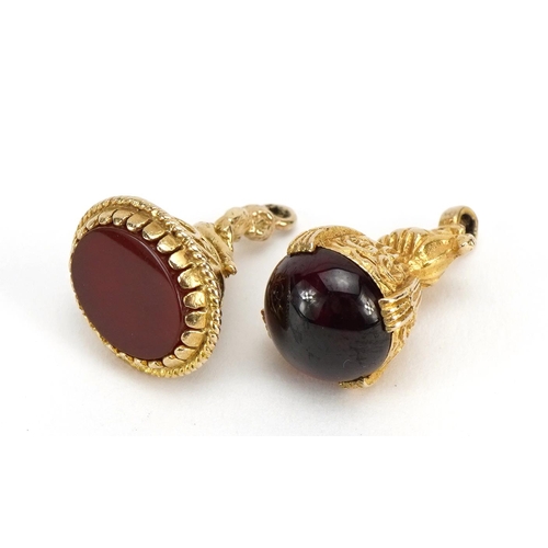 1105 - Two 9ct gold seal fobs, one set with a carnelian, the largest 2.4cm high, total 8.8g