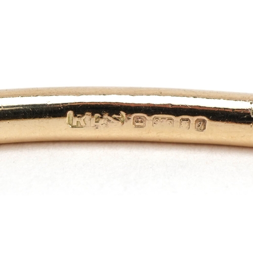 1013 - 9ct gold bangle, 7.6cm in diameter, 28.5g