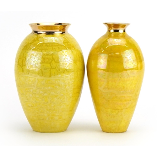 47 - Atkinson Jones, two contemporary lustreware vases having yellow glazes, each 16.5cm high