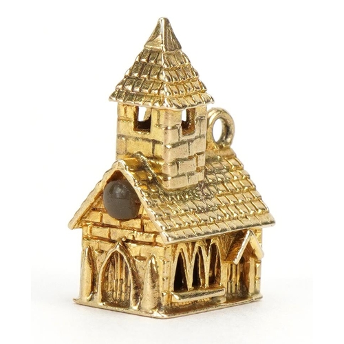 1092 - 9ct gold church charm with stanhope, 2.0cm high, 4.3g