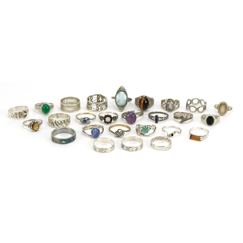 1508 - Twenty six silver and white metal rings, some set with cabochon stones, various sizes, total 70.4g