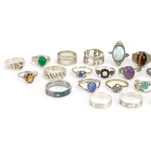 1508 - Twenty six silver and white metal rings, some set with cabochon stones, various sizes, total 70.4g