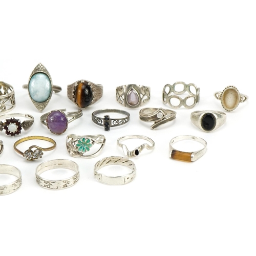 1508 - Twenty six silver and white metal rings, some set with cabochon stones, various sizes, total 70.4g