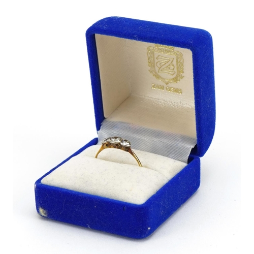 1022 - Unmarked gold diamond three stone ring, the largest diamond approximately 3.6mm x 3.2mm. size P, 1.9... 