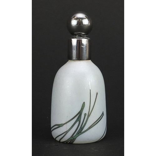 35 - John Ditchfield, Glasform iridescent art glass scent bottle with white metal stopper and collar, etc... 