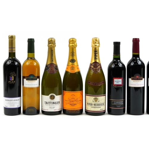 126 - Nine bottles of Champagne, port and red wine including Veuve Clicquot Ponsardin, Taittinger and Just... 