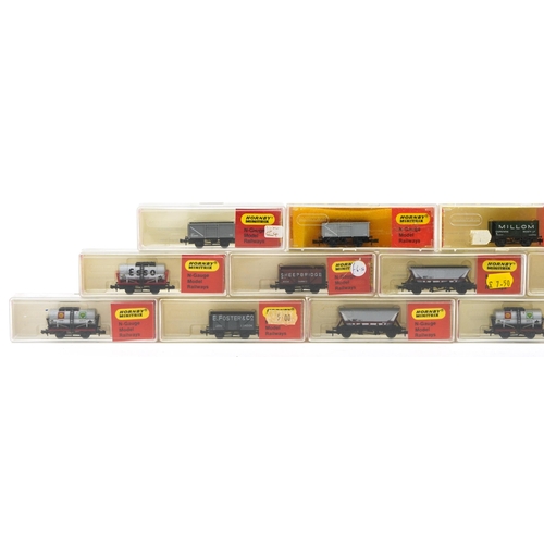 482 - Fifteen Hornby Minitrix N gauge model railway tankers and wagons with cases