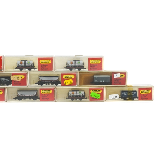480 - Fifteen Hornby Minitrix N gauge model railway tankers and wagons with cases
