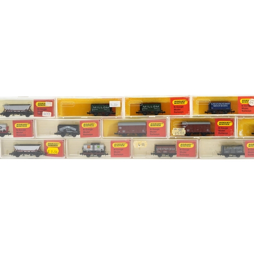 483 - Fifteen Hornby Minitrix N gauge model railway tankers and wagons with cases