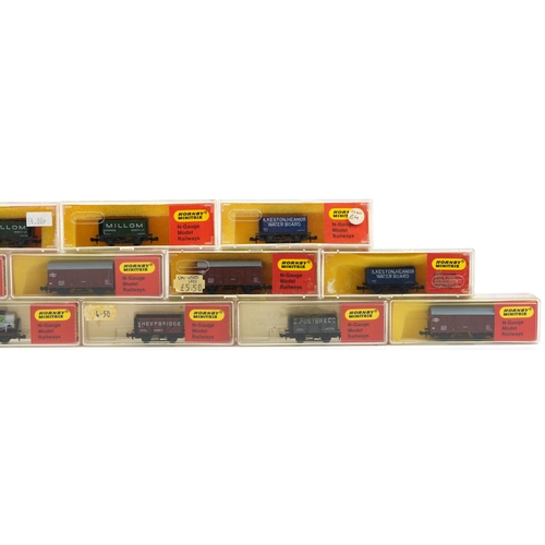 483 - Fifteen Hornby Minitrix N gauge model railway tankers and wagons with cases