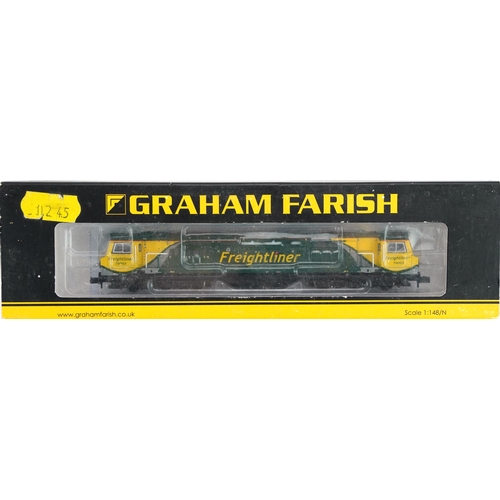 373 - Two Graham Farish N gauge model railway locomotives with cases, numbers 371-385 and 371-636