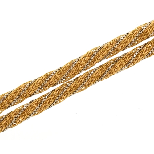 1079 - 18ct two tone gold rope twist necklace with 1980s insurance valuation, 61cm in length, 41.9g