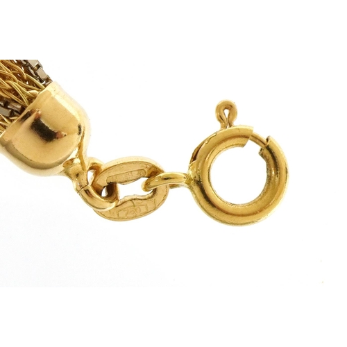 1079 - 18ct two tone gold rope twist necklace with 1980s insurance valuation, 61cm in length, 41.9g