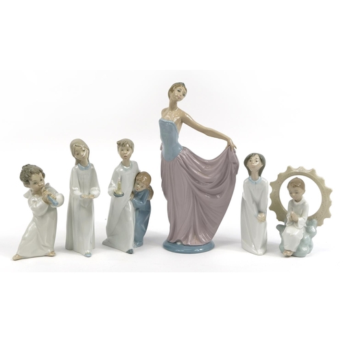 52 - Seven Lladro and Nao figures and figurines including a large dancer and angels, the largest 31cm hig... 