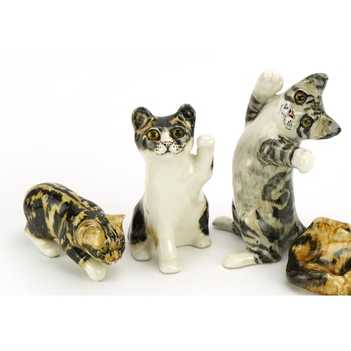 65 - Four Winstanley pottery cats with beaded eyes, the largest 25cm high