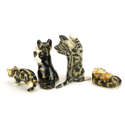 65 - Four Winstanley pottery cats with beaded eyes, the largest 25cm high