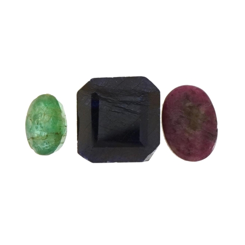 1536 - Three gemstones with certificates comprising ruby 2.65 carat, emerald 1.10 carat and sapphire 7.95 c... 