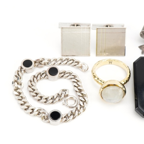 1597 - Silver jewellery including curb link bracelet set with black hardstones, silver gilt cabochon ring, ... 