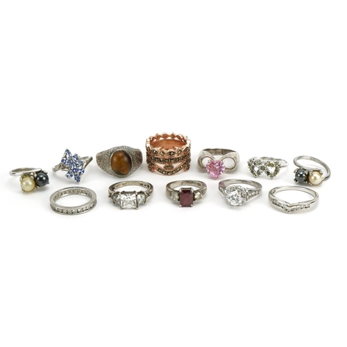 1516 - Twelve silver rings, some set with semi precious stones, various sizes, total 53.0g