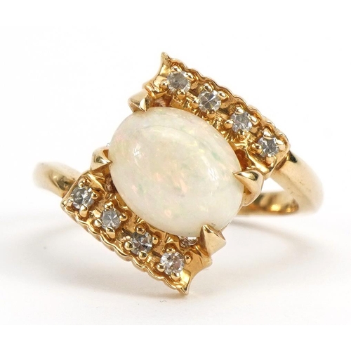 1086 - 14k gold cabochon opal and diamond crossover ring, size N, 4.8g