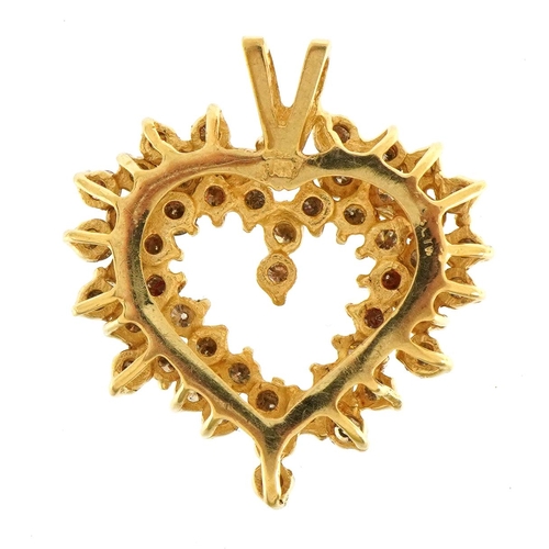 1037 - 14K Gold diamond love heart cluster pendant, indistinctly stamped to the reverse, 3.1cm high, 8.4g