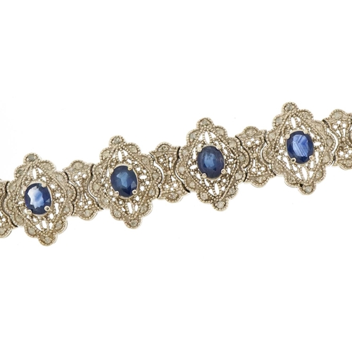 1066 - 14ct white gold sapphire and diamond bracelet, 18.5cm in length, 32.8g