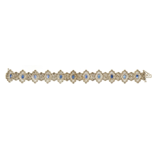 1066 - 14ct white gold sapphire and diamond bracelet, 18.5cm in length, 32.8g