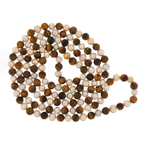 1517 - Tiger's eye and pearl bead necklace, 120cm in length, 114.1g