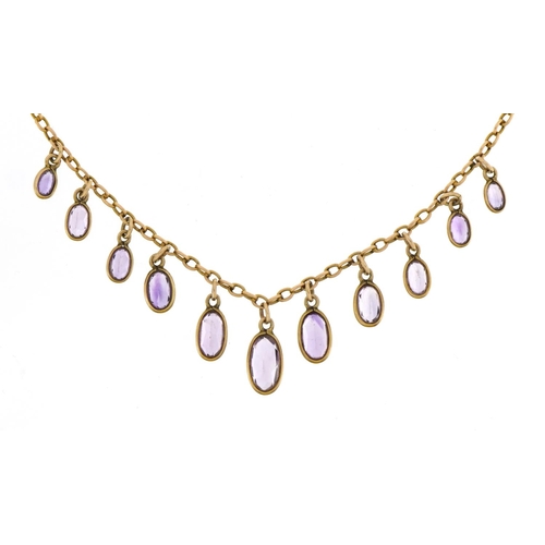 1077 - Victorian 9ct gold necklace set with eleven graduated amethysts, 43cm in length, 5.9g