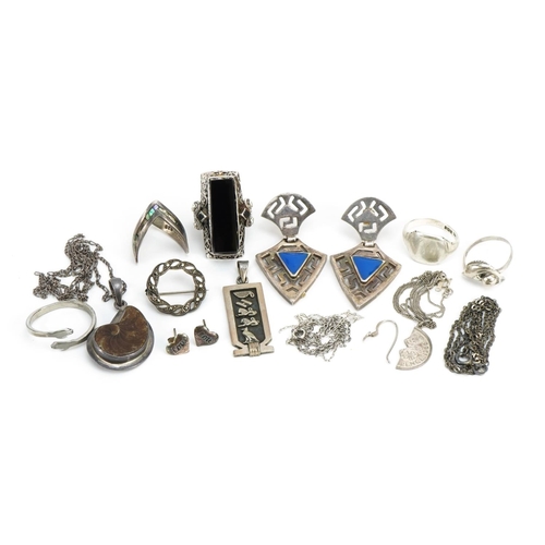 1568 - Silver and white metal jewellery including an ammonite pendant, Egyptian pendant with hieroglyphs, m... 