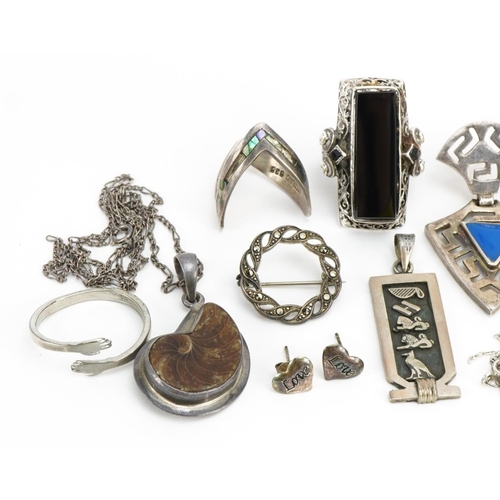 1568 - Silver and white metal jewellery including an ammonite pendant, Egyptian pendant with hieroglyphs, m... 