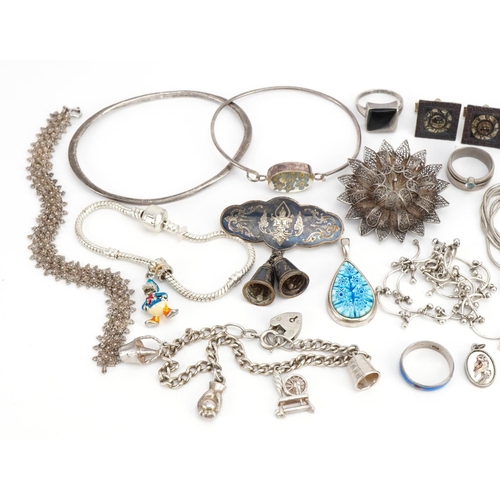 1501 - Victorian and later silver jewellery including charm bracelets, one with Enamelled Donald Duck charm... 