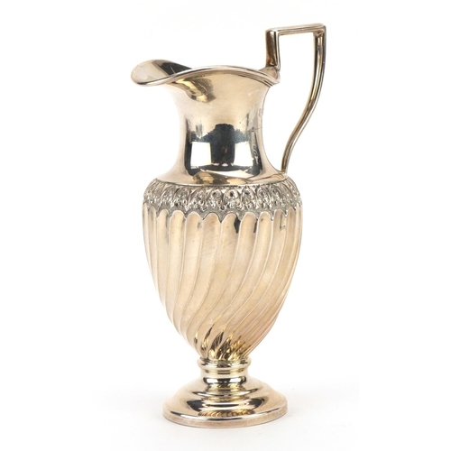 154 - Josiah Williams & Co, Edward VII silver pedestal cream jug with writhen body, London 1901, 15cm high... 