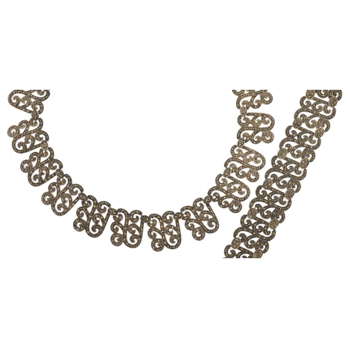 1560 - Silver marcasite choker necklace and matching bracelet, the necklace 40cm in length, total 107.7g