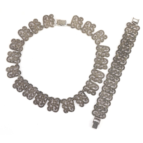 1560 - Silver marcasite choker necklace and matching bracelet, the necklace 40cm in length, total 107.7g