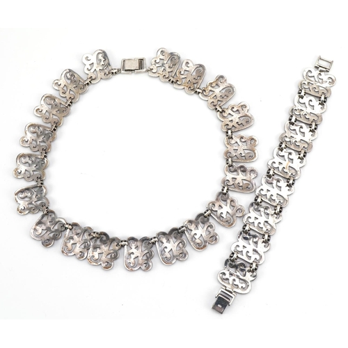 1560 - Silver marcasite choker necklace and matching bracelet, the necklace 40cm in length, total 107.7g