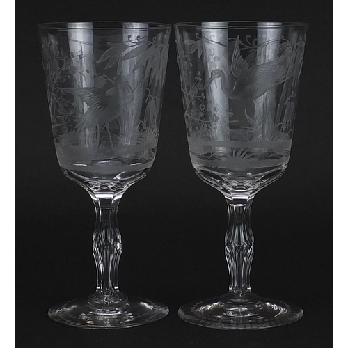 98 - Pair of aesthetic style glasses etched with cranes amongst bamboo grove and cherry blossom, each 16.... 