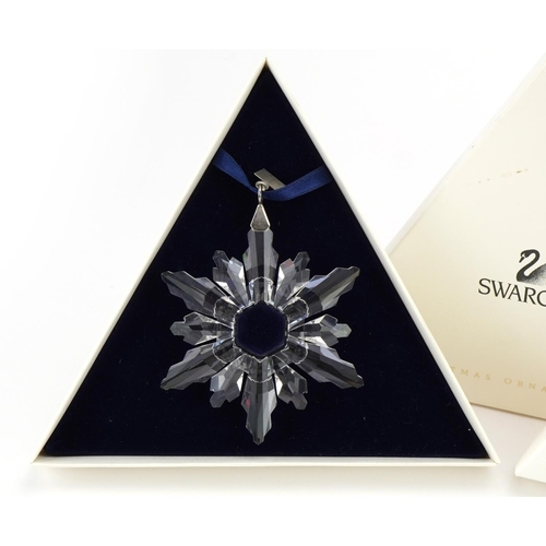 17 - Two Swarovski Crystal Christmas ornaments with boxes comprising dates 1998 and 1999