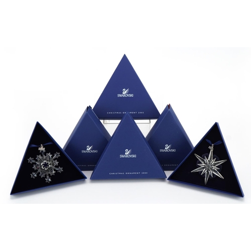 14 - Two Swarovski Crystal Christmas ornaments with boxes comprising dates 2004 and 2005