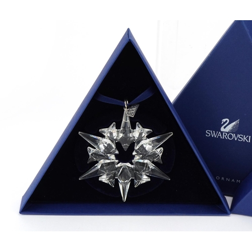 13 - Two Swarovski Crystal Christmas ornaments with boxes comprising dates 2006 and 2007